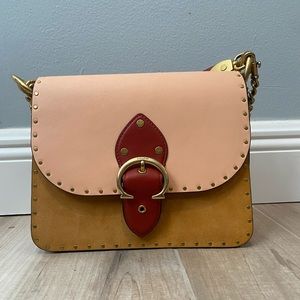 Coach color block beat bag, shoulder with rivets.